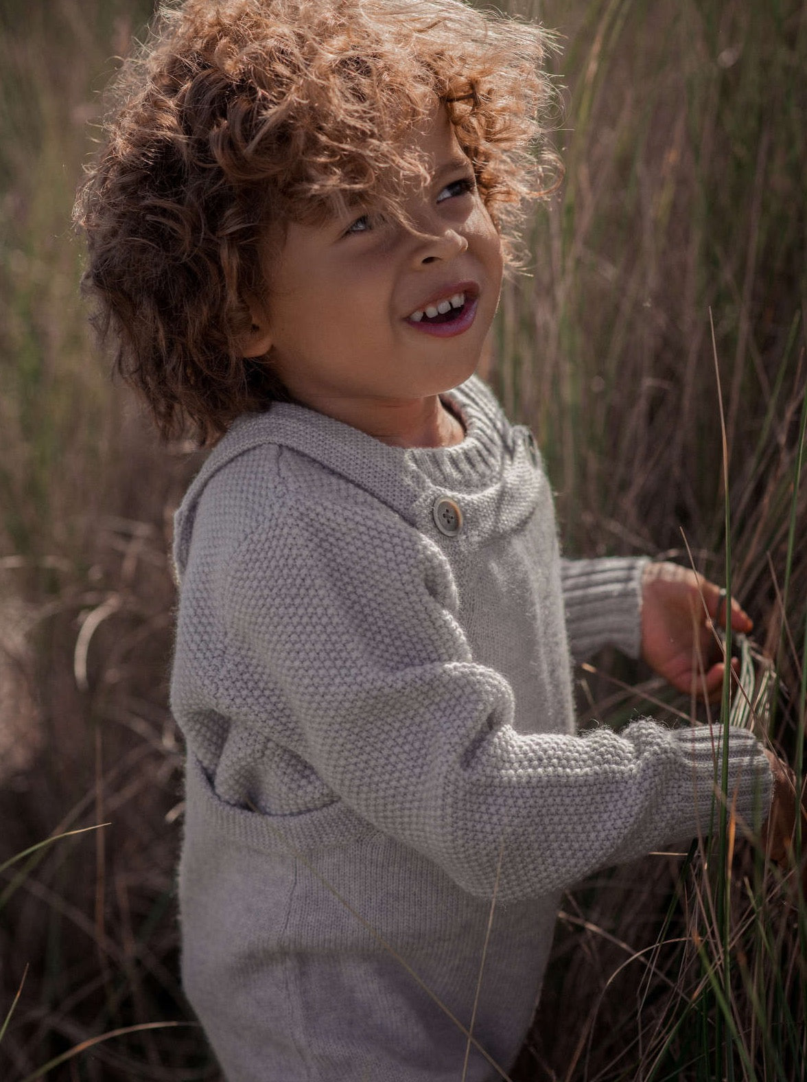 These warm 4 ply Dungarees come with sweet side pockets and extendable cuffs which can be lengthened as your Little One grows. Made with the softest cashmere/ merino blend from Inner Mongolia, they will keep your Little One stylish and warm all winter long. Team it up with our Bobble Jumper in matching grey for for a head-to-toe cosy feel.