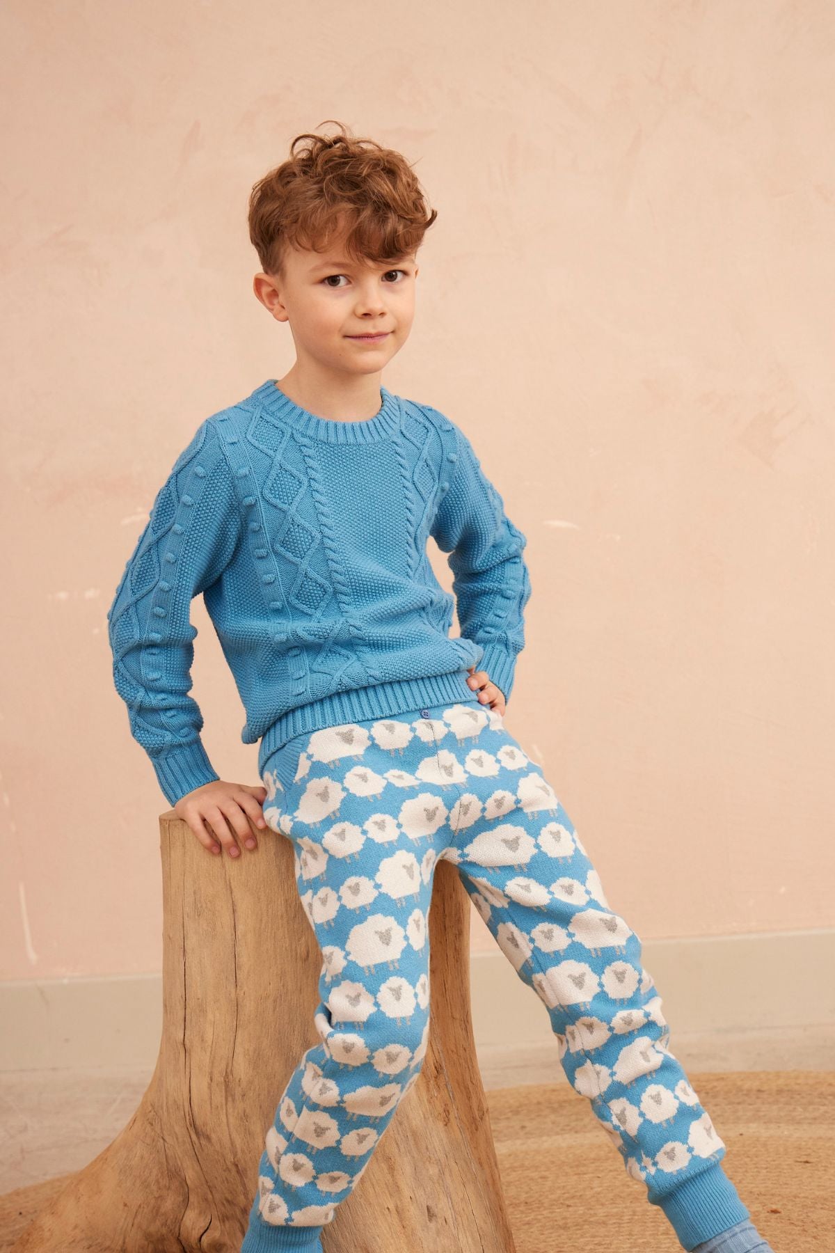 Cable Popcorn Jumper in Iceland Blue organic cotton/cashmere – close up front side view