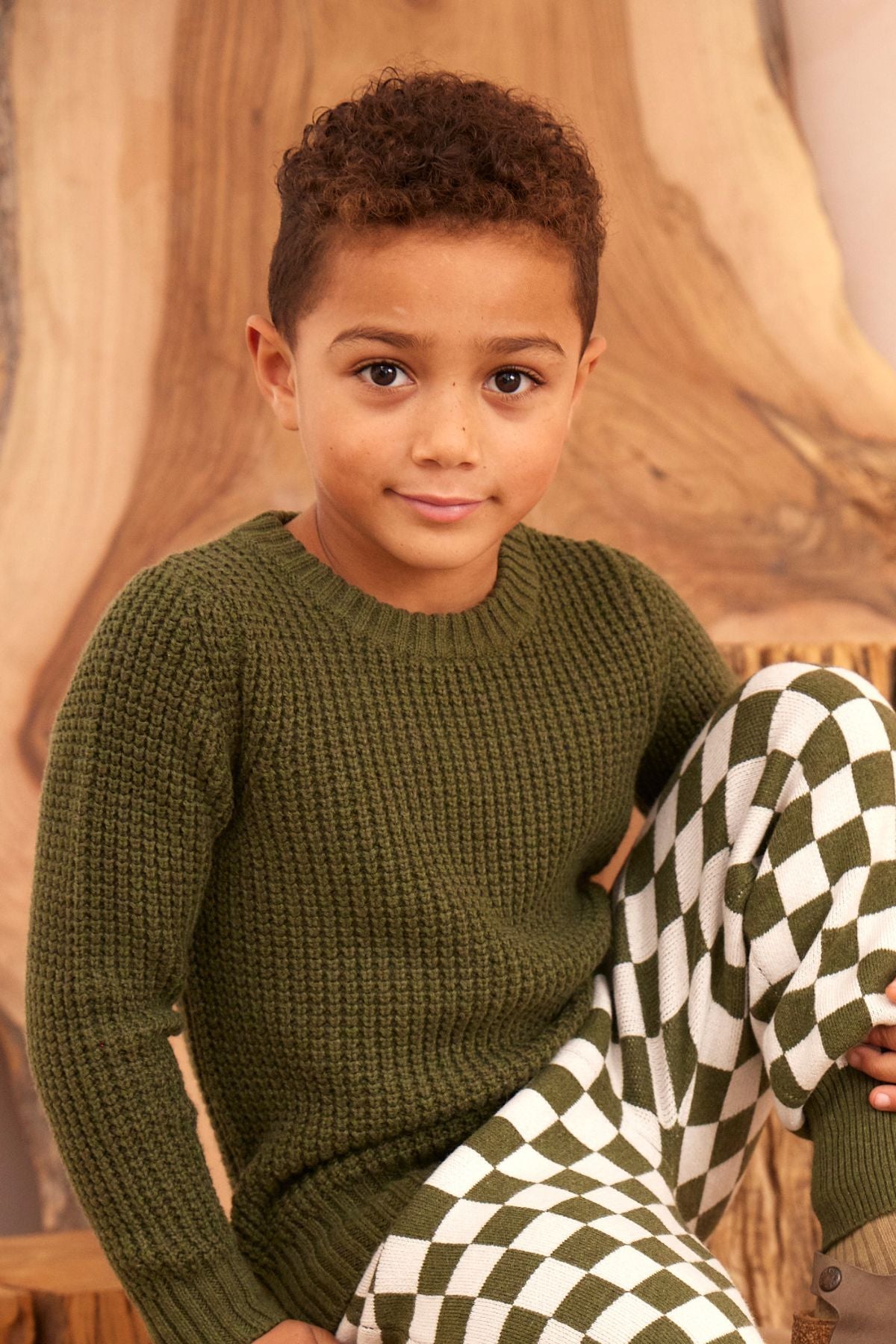 Waffle knit jumper in Avocado in organic cotton cashmere, close up side view