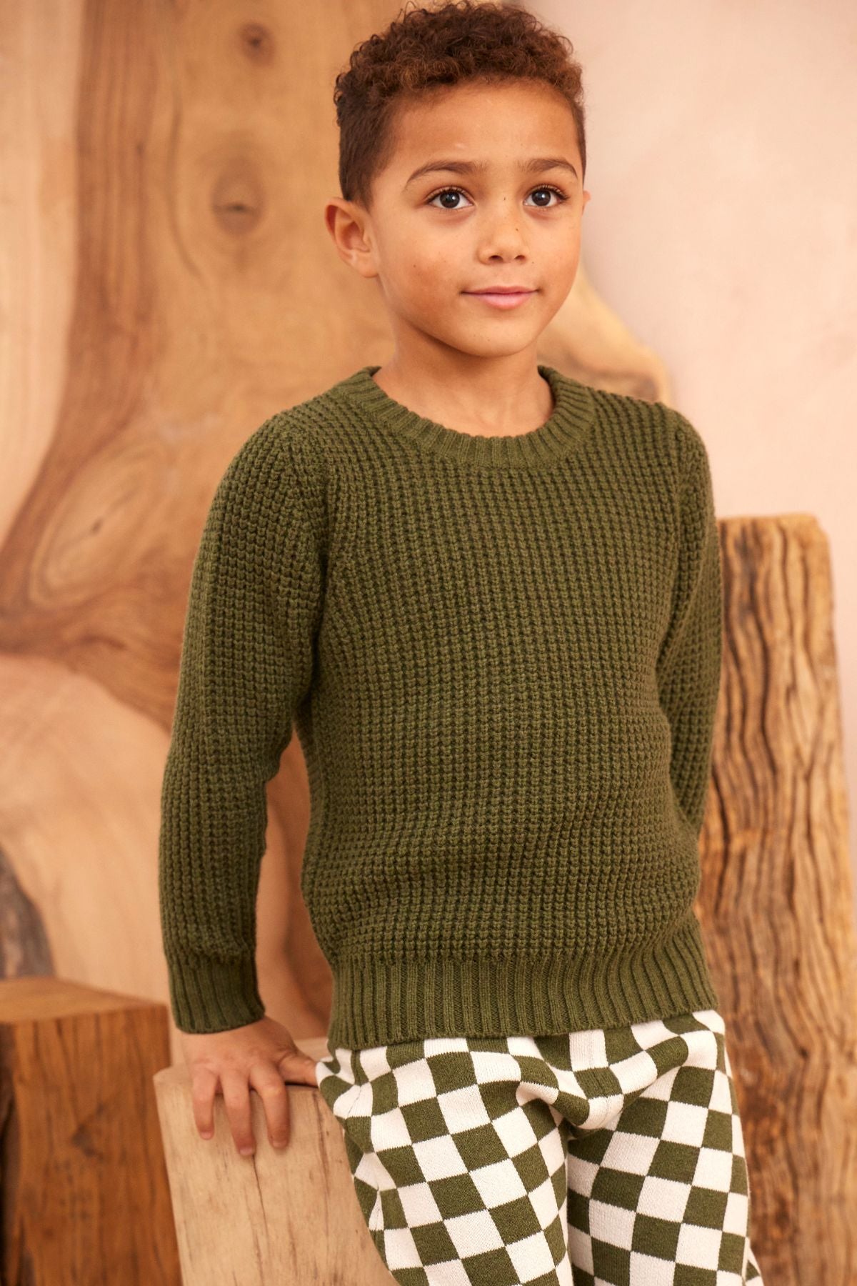 Waffle knit jumper in Avocado in organic cotton cashmere, close up front view