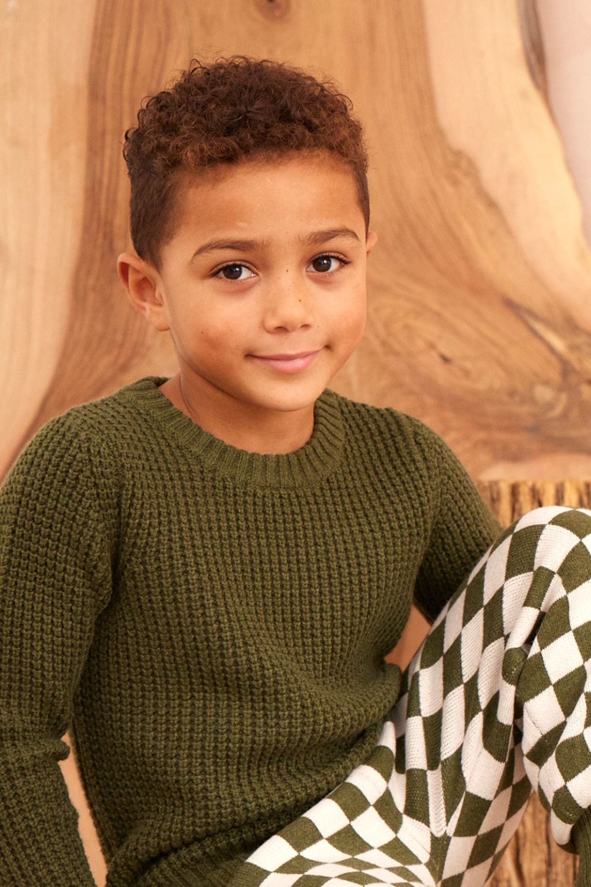 Waffle knit jumper in Avocado in organic cotton cashmere, close up front view