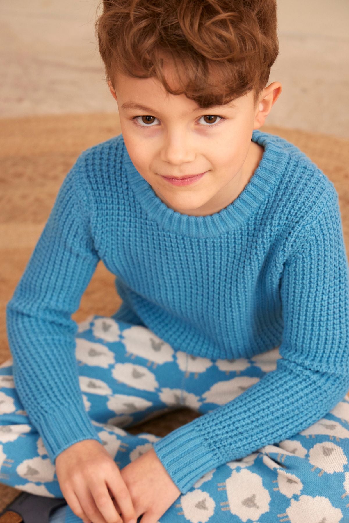 Waffle knit jumper in Iceland Blue in organic cotton cashmere, close up top view