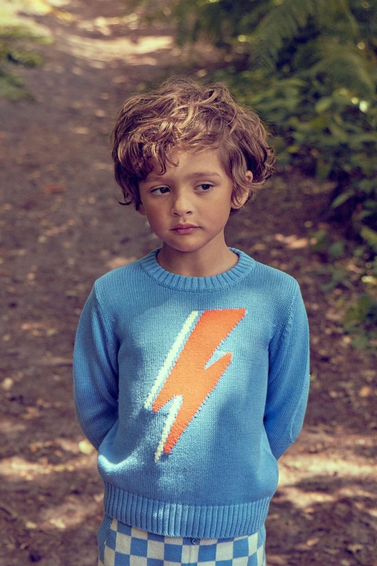 Boy in the azure Lightning Bolt Jumper from MIKA & MILO, intarsia knit in organic cotton and cashmere