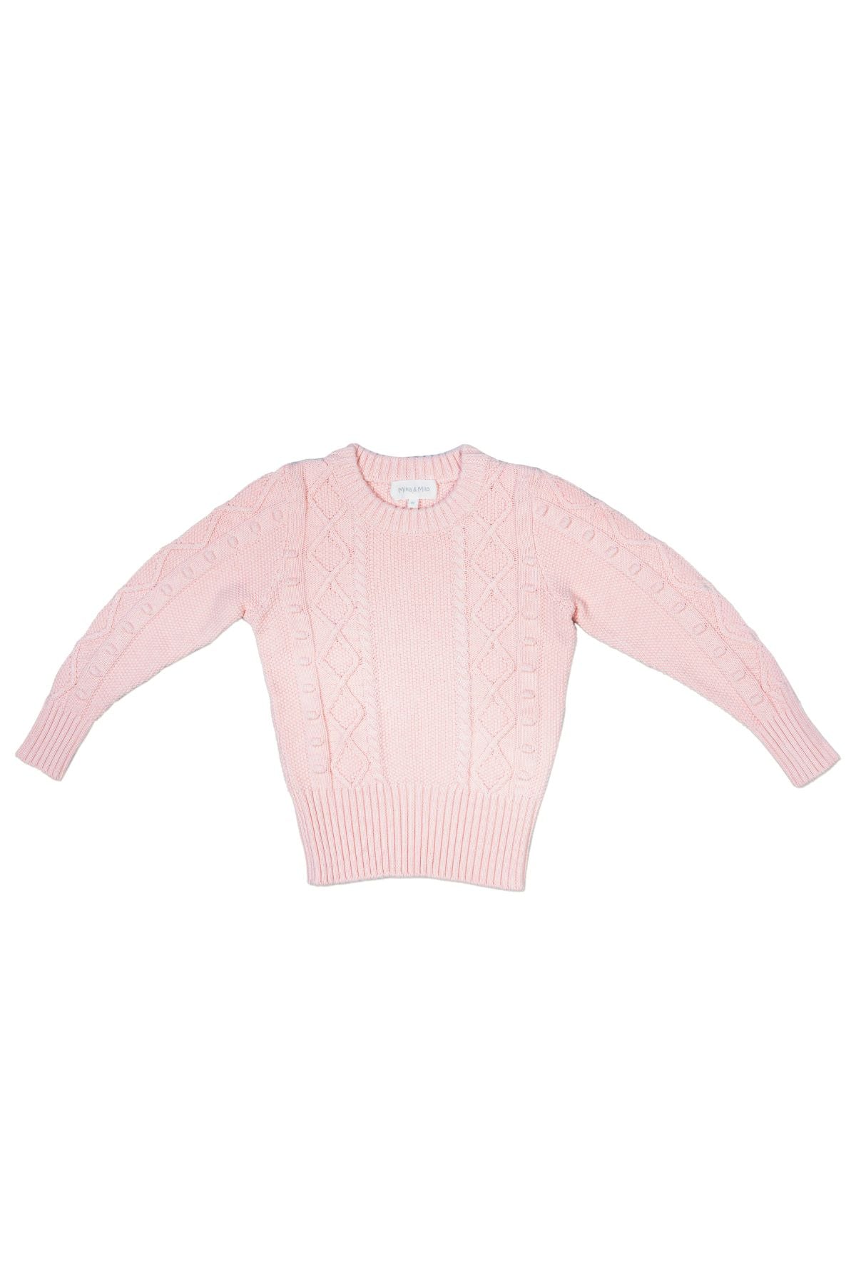 Young girl in a blush Cable Popcorn Jumper from MIKA & MILO, dense organic cotton and cashmere knit