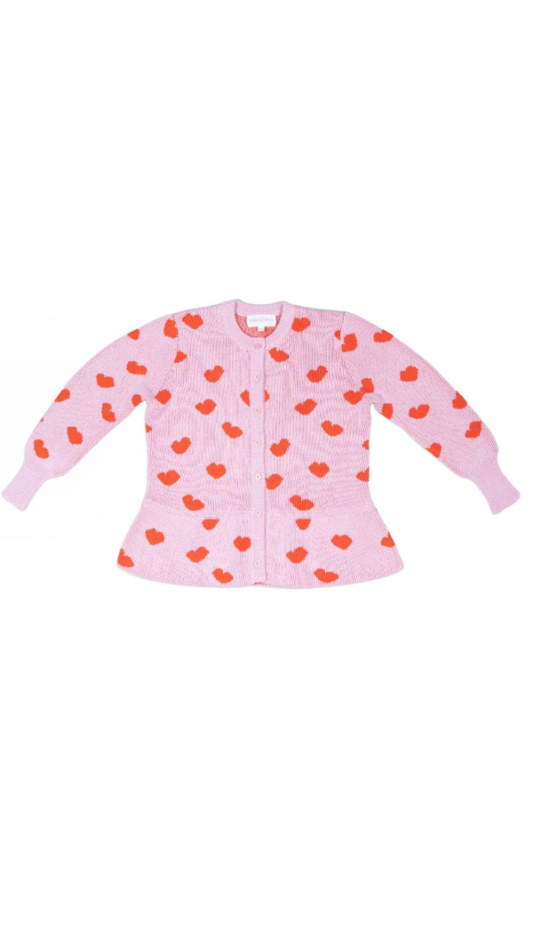 Front view of the bubble gum Love Hearts Ruffled Jacket from MIKA & MILO showing the jacquard heart knit and ruffle hem