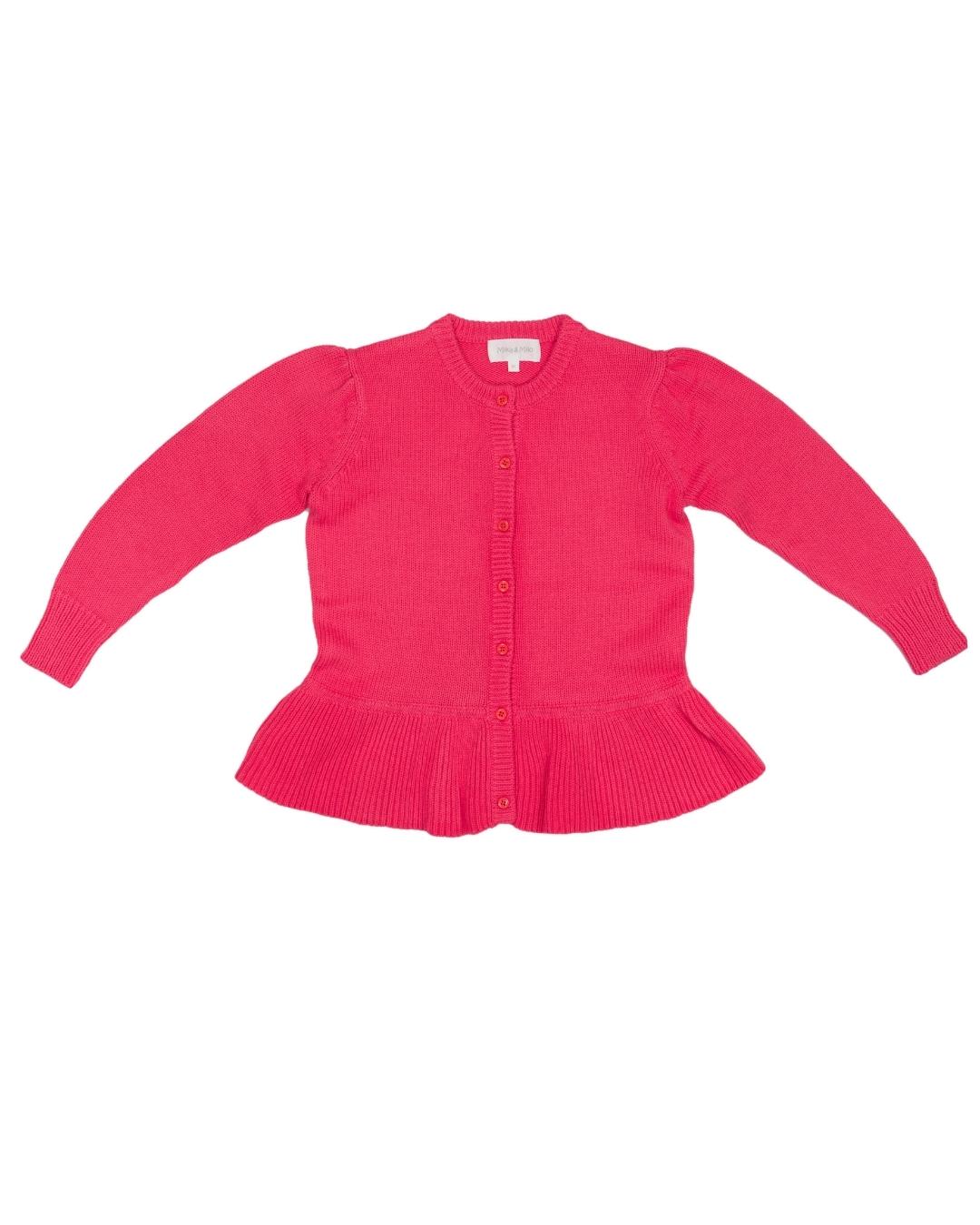 Young girl in the raspberry Ruffled Hem Jacket from MIKA & MILO, organic cotton and cashmere knit with ruffle hem