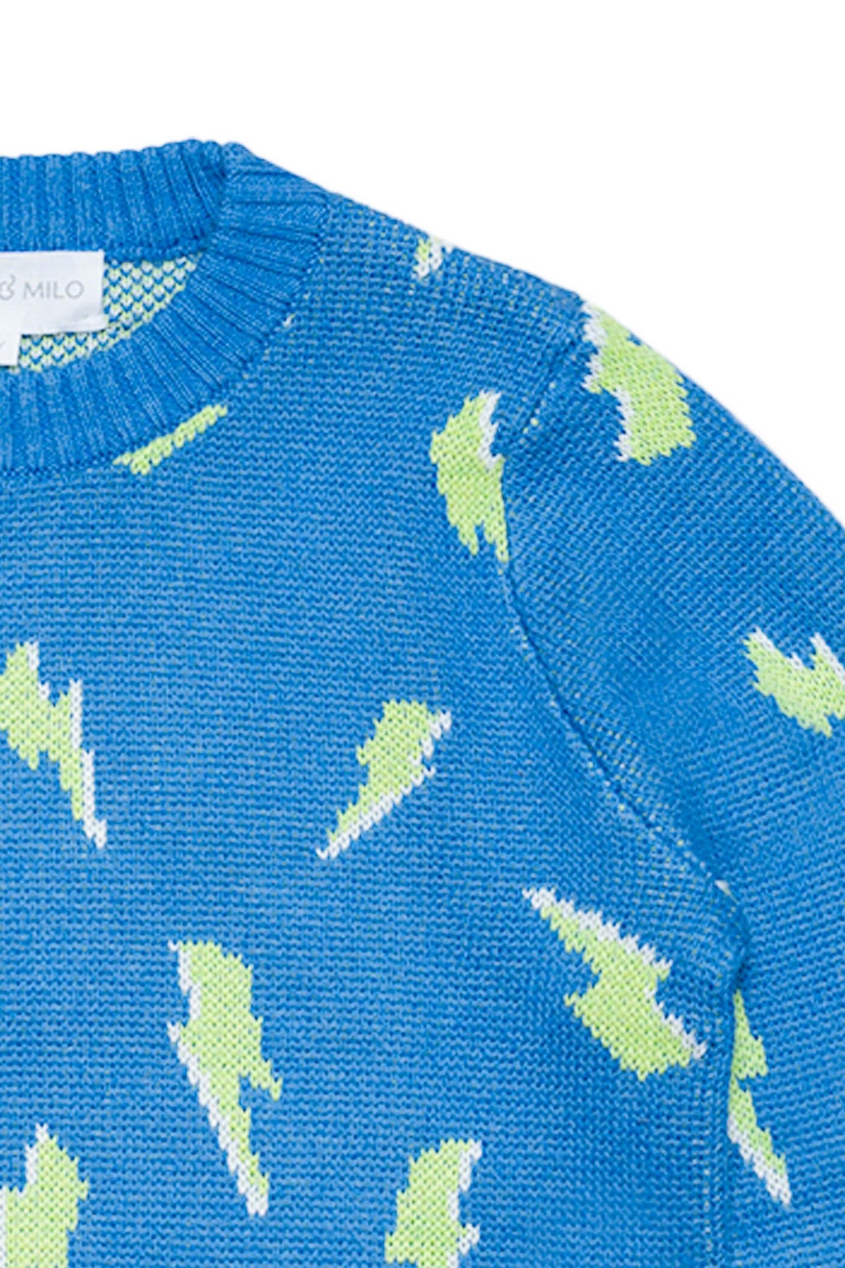 Close-up of the jacquard-knit lightning bolts on the hussar blue jumper