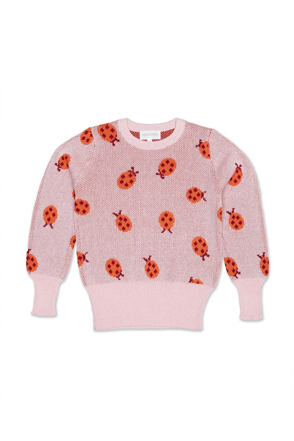 Front view of the Ladybird Jumper in rose pink with lolly pop red jacquard ladybirds