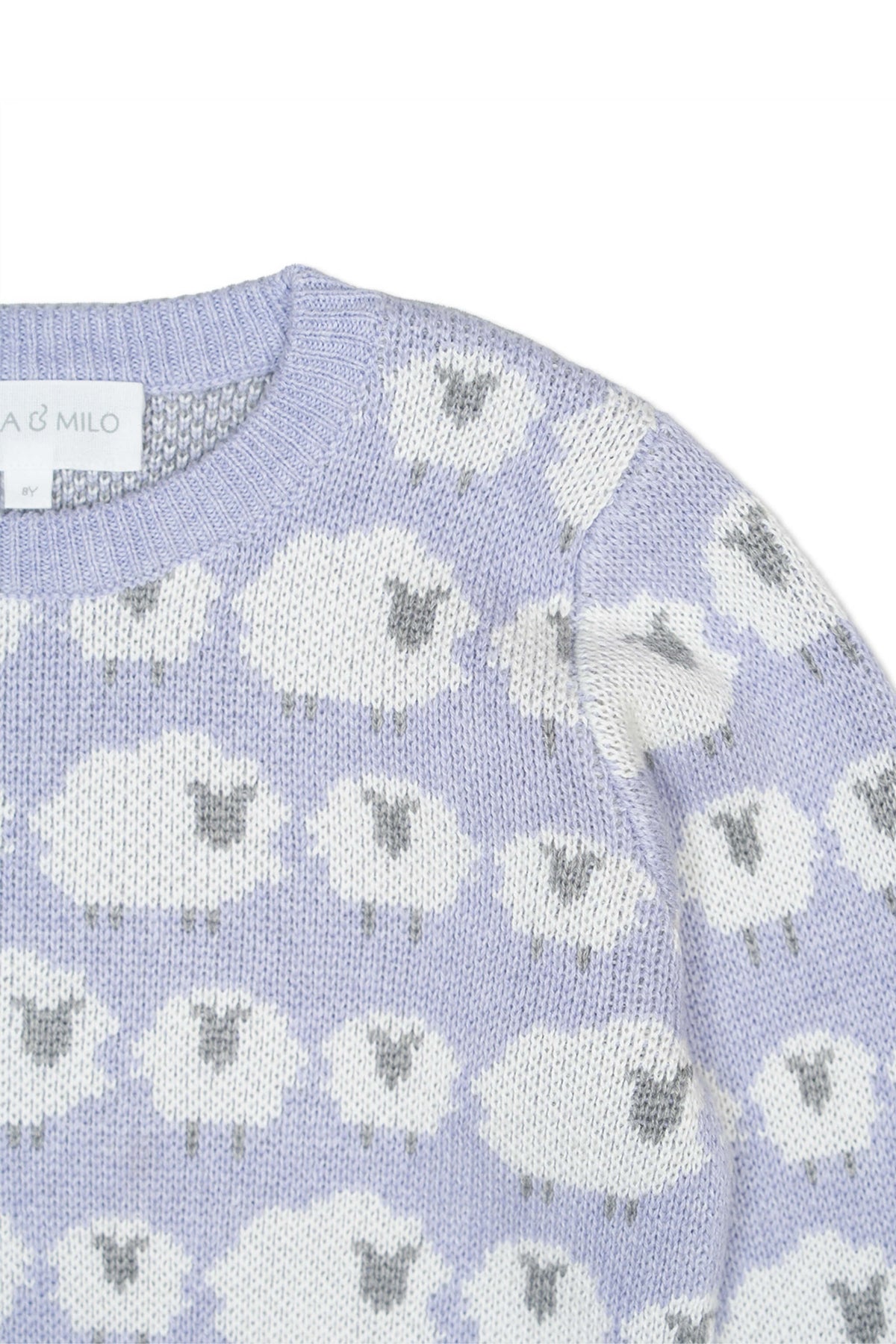 Close-up of the jacquard-knit sheep on the lavender jumper