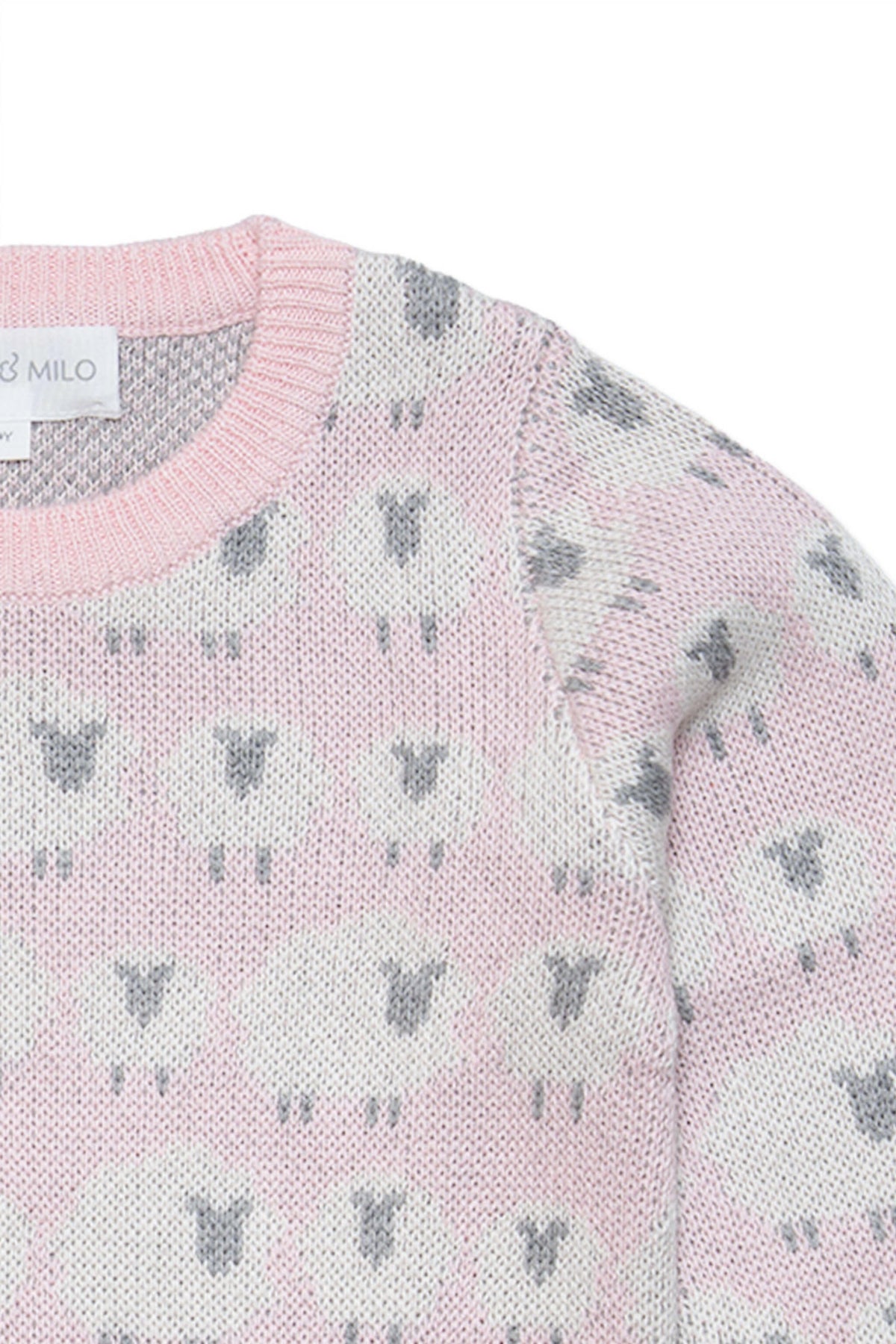 Close-up of the jacquard-knit sheep on the rose pink jumper