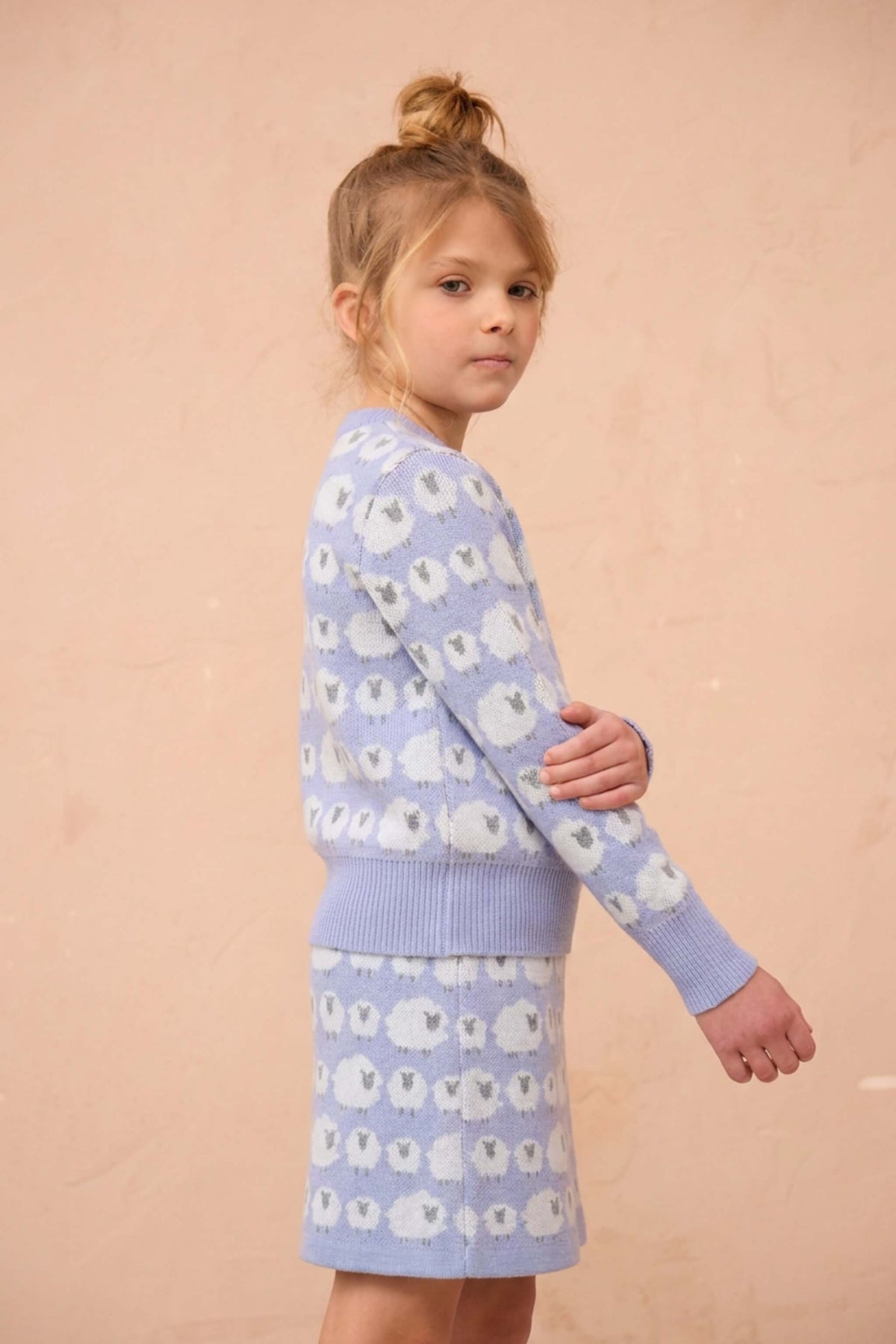 Girl wearing the Little Bo Peep Skirt in lavender