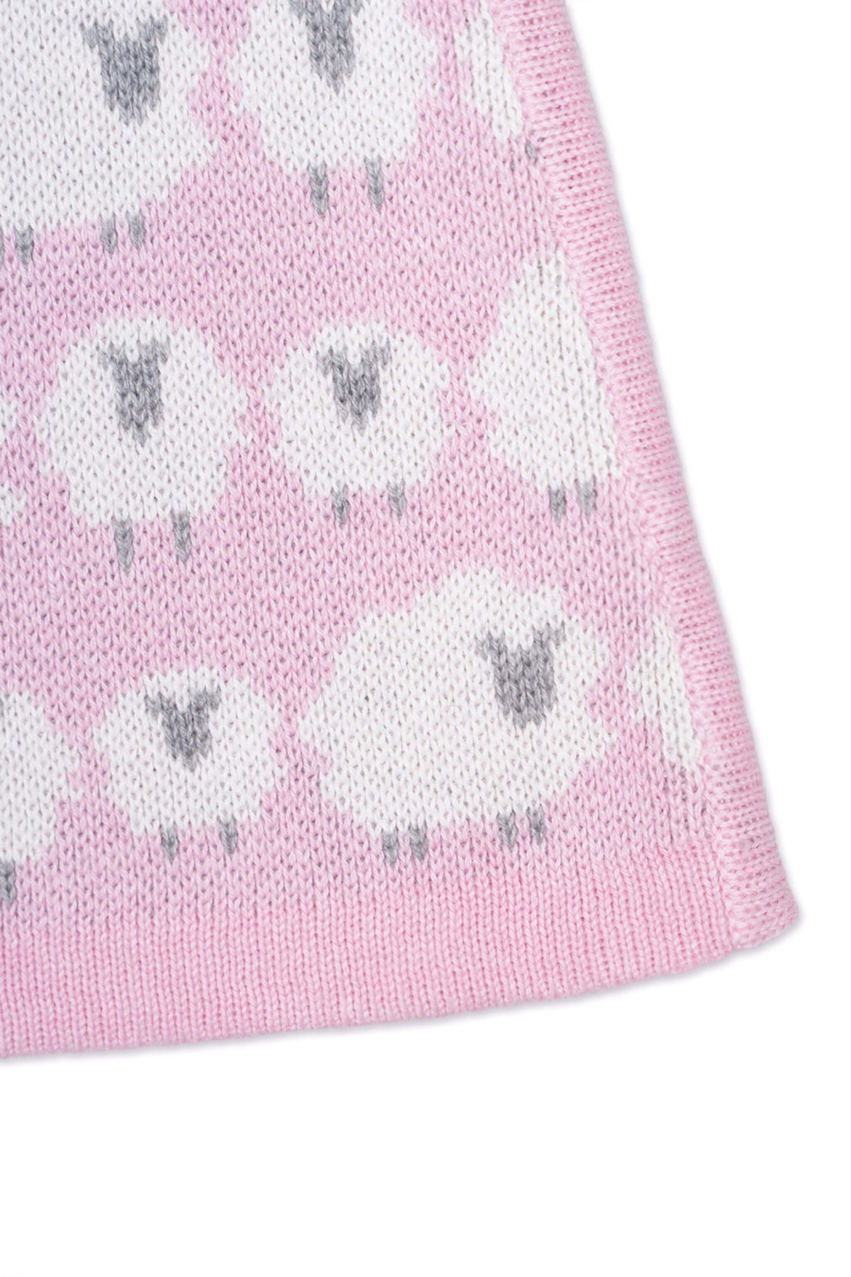 Close-up of the jacquard-knit sheep on the bubble gum pink skirt
