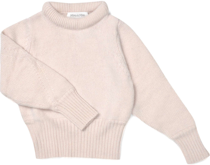 This timeless 4 ply Jumper comes with a chunky collar and fancy knitting on the sleeves. Made with pure 100% cashmere from Inner Mongolia, it is a classic piece which will keep your Little One stylish and warm all winter long.  Team it up with any of our pleated Tennis Skirts for a head-to-toe cosy feel. 
