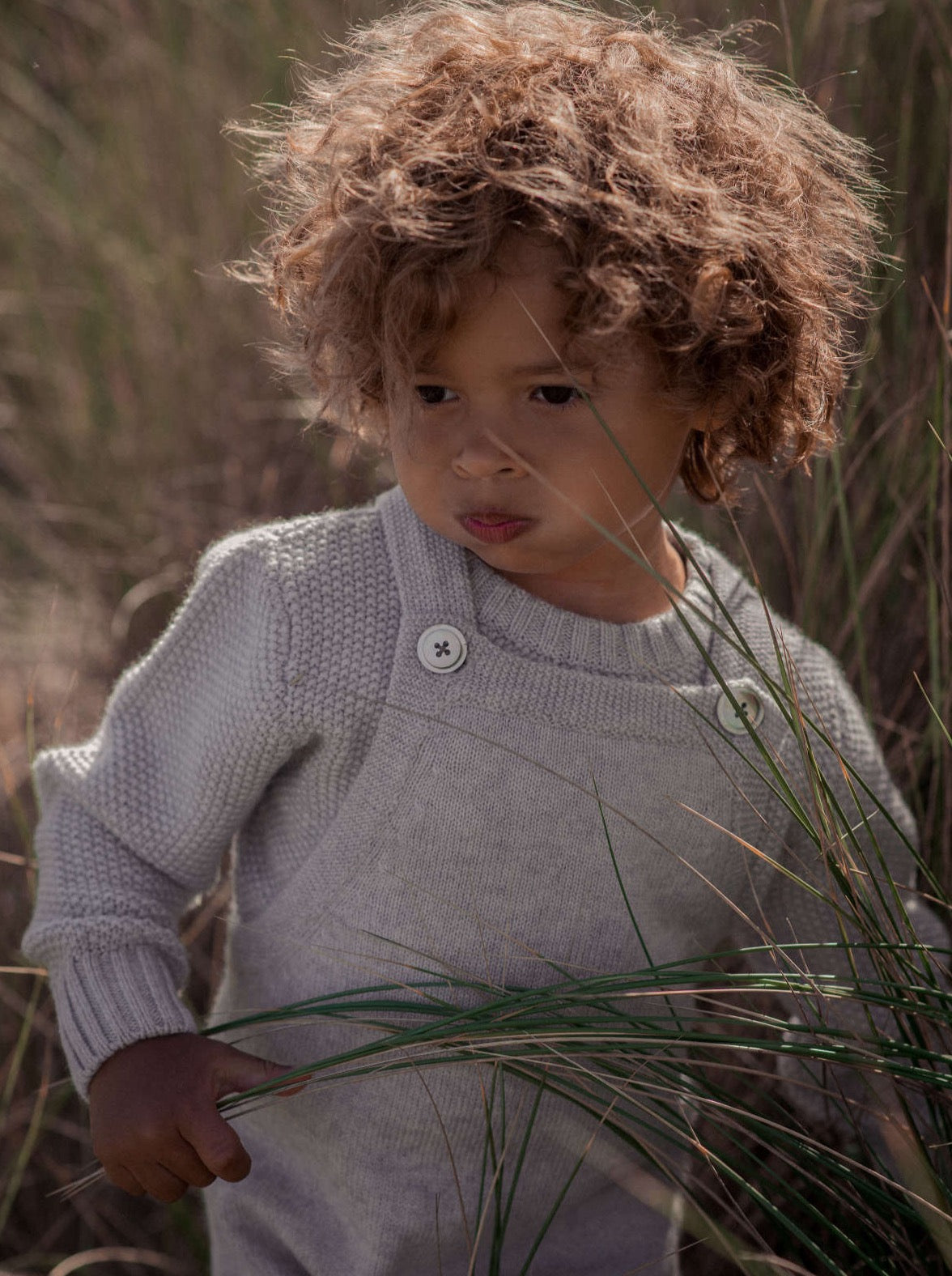 These warm 4 ply Dungarees come with sweet side pockets and extendable cuffs which can be lengthened as your Little One grows. Made with the softest cashmere/ merino blend from Inner Mongolia, they will keep your Little One stylish and warm all winter long.  Team it up with our Bobble Jumper in matching grey for for a head-to-toe cosy feel. 